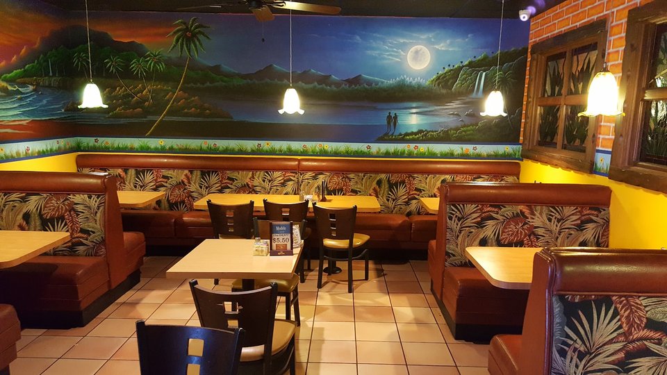 Mexican restaurant interior with colorful wall decor.