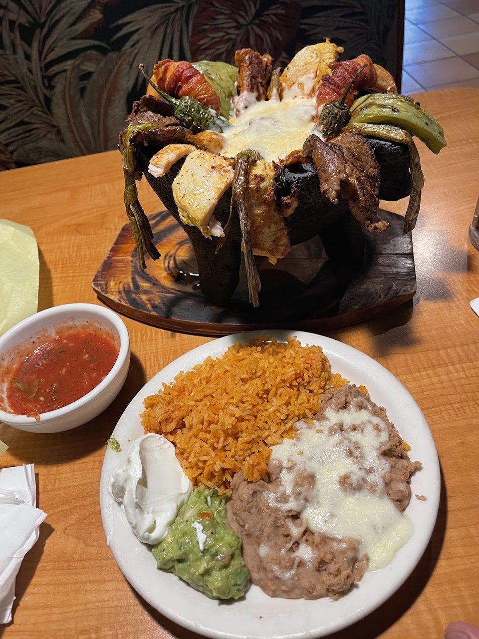 Mexican dishes listed beside beer and wine.