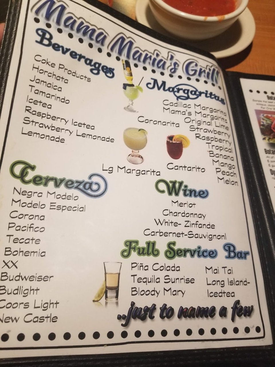 Restaurant menu featuring plates, drinks, and sampler options.